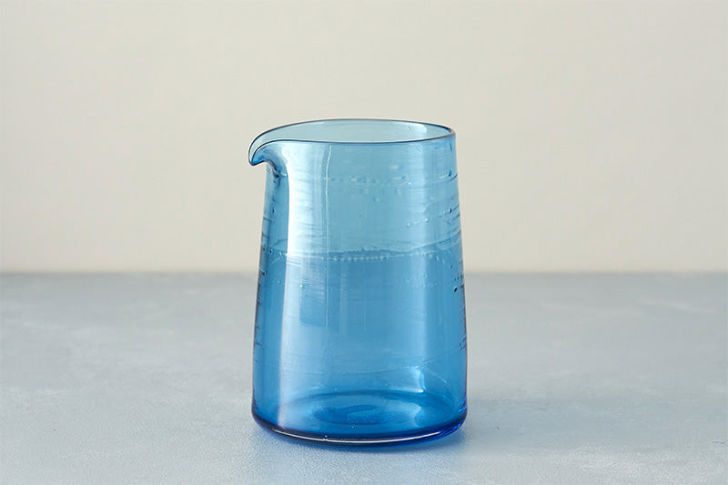 small turquoise blue glass jug