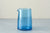 small turquoise blue glass jug