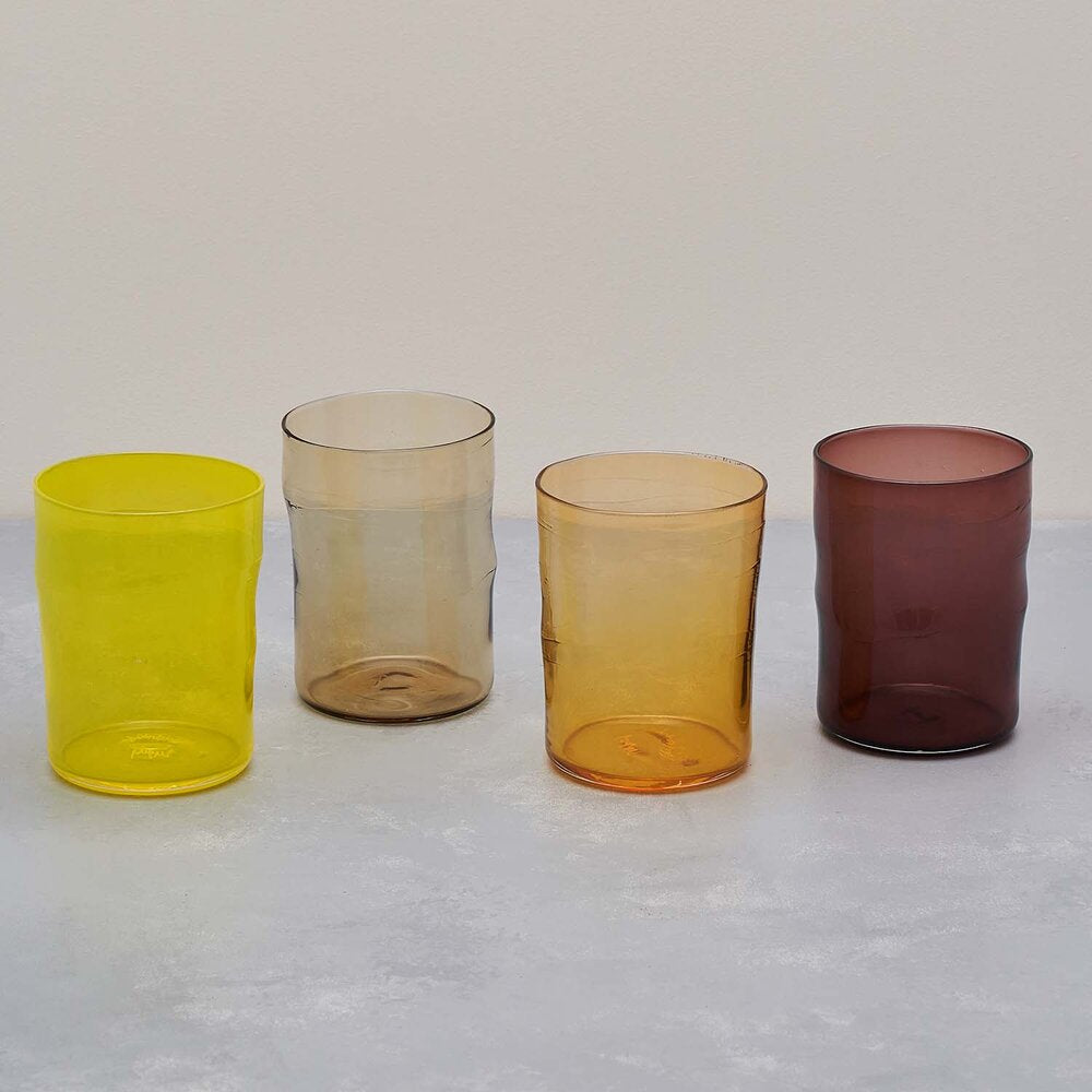 Set of four colored highball glasses